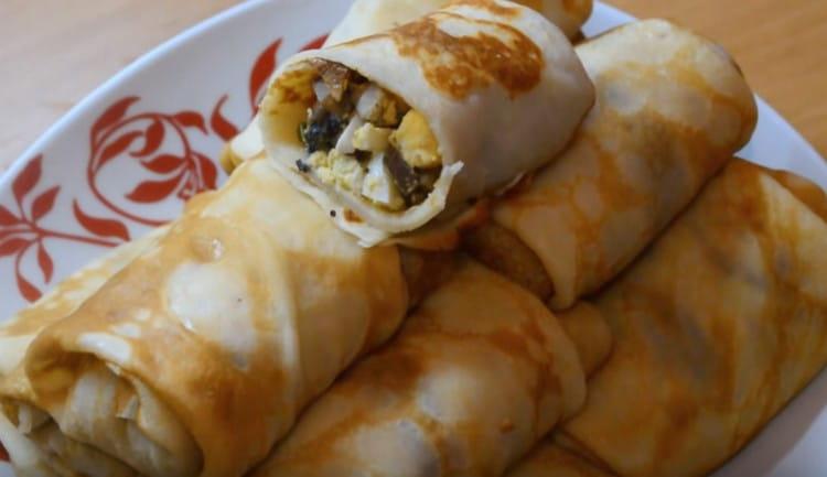 Можете да приготвите такива вкусни палачинки с гъби по нашата рецепта със снимка.