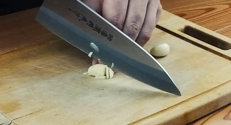 Готварски калмари в сос от заквасена сметана